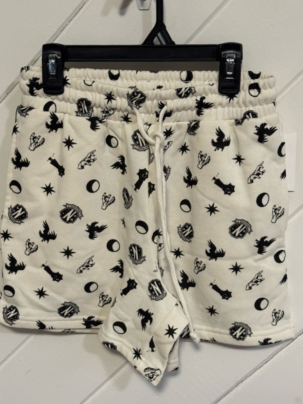 Cream Drawstring Shorts with Black Graphic Print